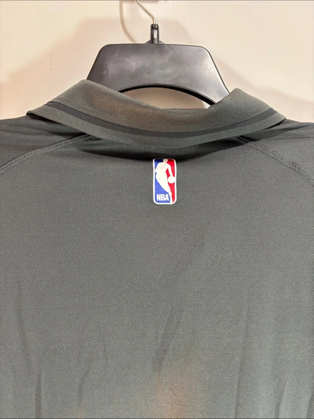 Jordan Black Charlotte Hornets Polo with White Jumpman. 0189
